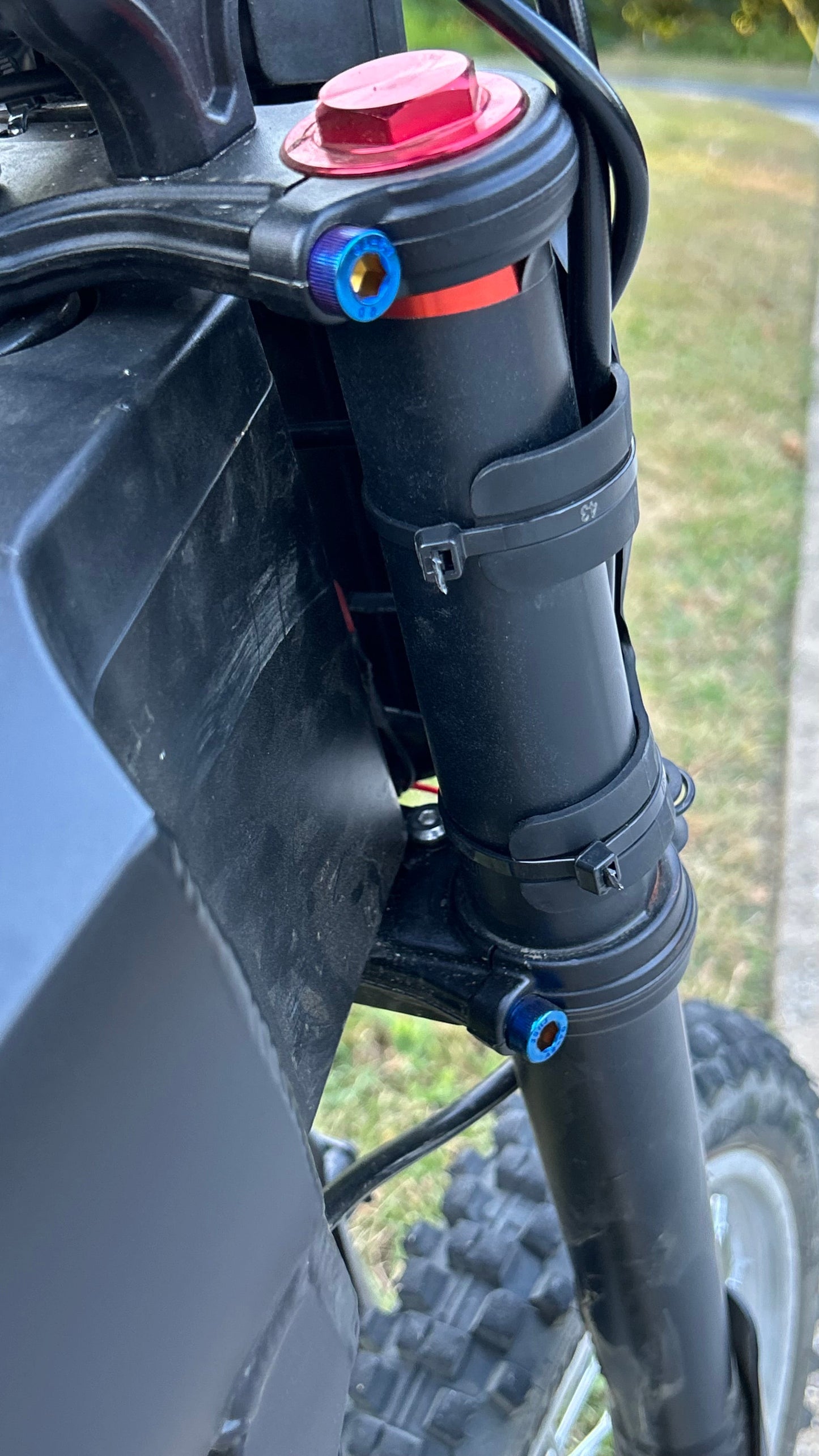 Titanium coated tuttio suspension bolts