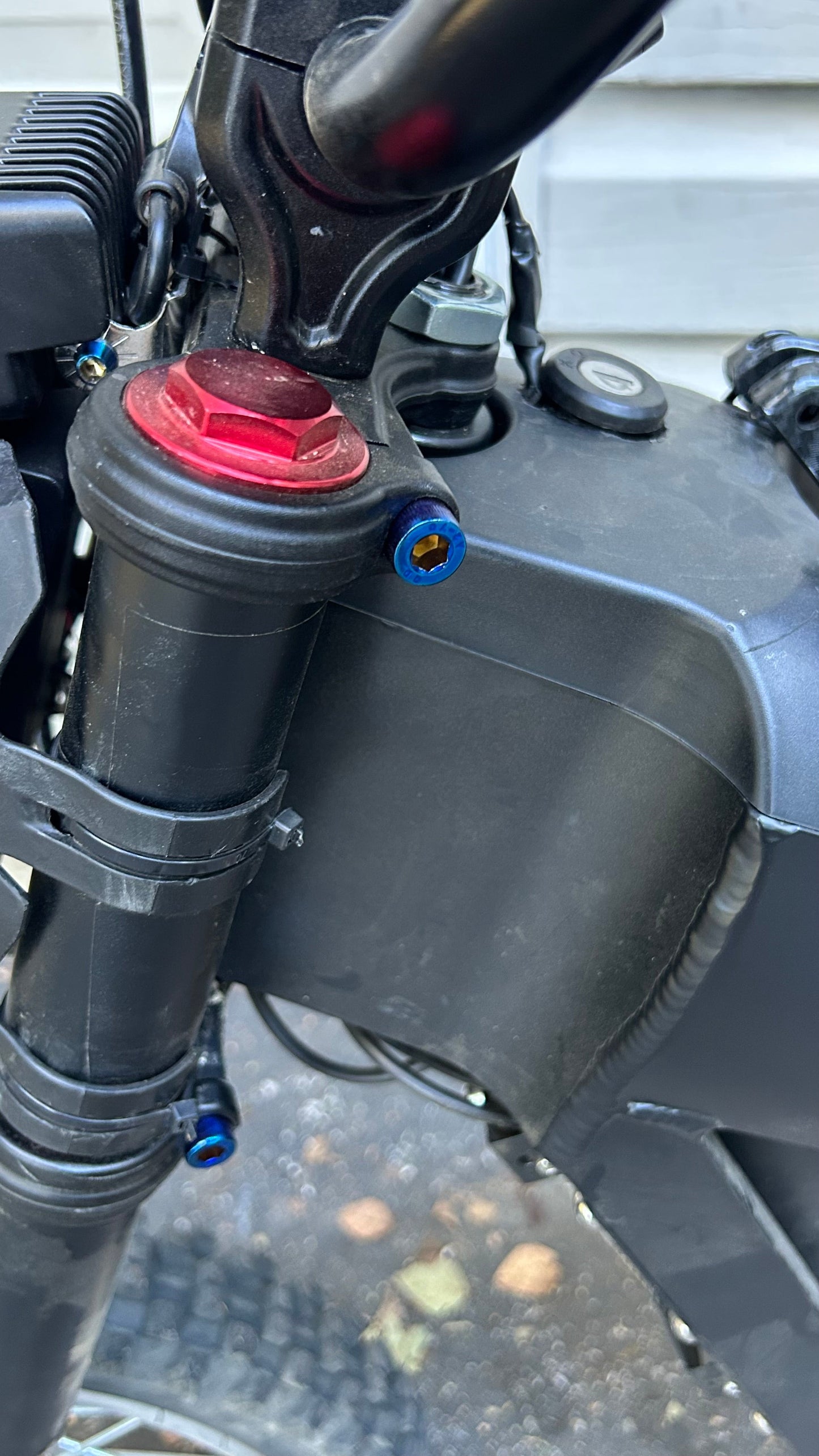 Titanium coated tuttio suspension bolts